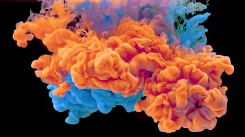 Abstract Footage of Vibrant Ink Mixing on Black