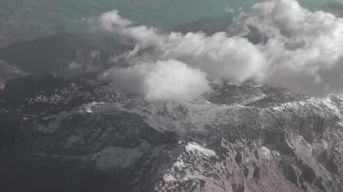 Aerial View of Mountains. Looking From the Flying Plane