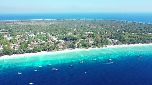Wide angle birds eye copy space shot of a sandy white paradise beach and aqua turquoise water backgr