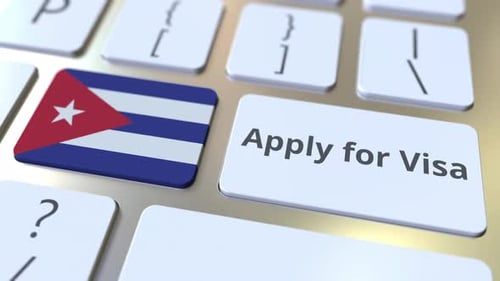 Pressing 'Apply for Visa' Button on Keyboard with Cuban Flag
