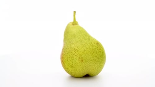 Rotating Pear on a White Background