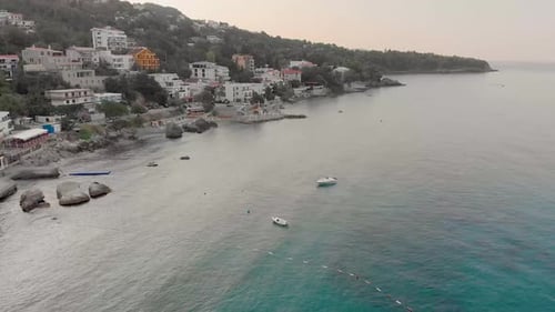 Aerial Drone Cinematic Footage of Sutomore Montenegro beach in the morning.