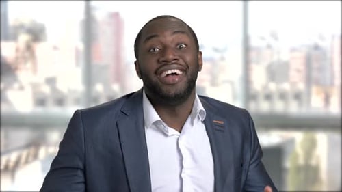 Expressive Businessman Shares Thoughts, Emotions