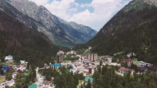 Aerial View of Village in Mountainous and Wooded Areas