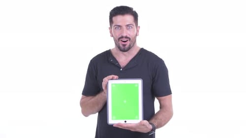 Adult Holds Tablet With Green Screen