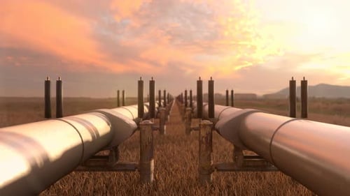 Pipeline Infrastructure Moving Through Field at Sunset