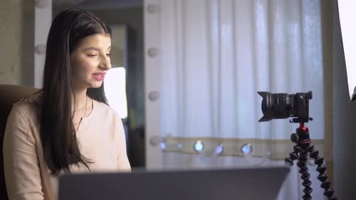 Young Woman Creates Online Video Content at Home