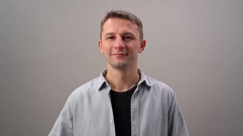 Friendly Man Gives Thumbs Up in Portrait