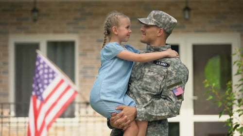 Handsome USA Soldier in Military Uniform Holding Happy Daughter, Homecoming
