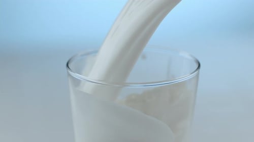 Milk pouring and splashing in slow motion; shot on Phantom Flex 4K at 1000 fps