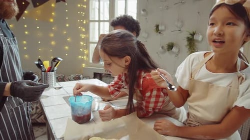 Kids Trying Sauce during Culinary Class with Chef