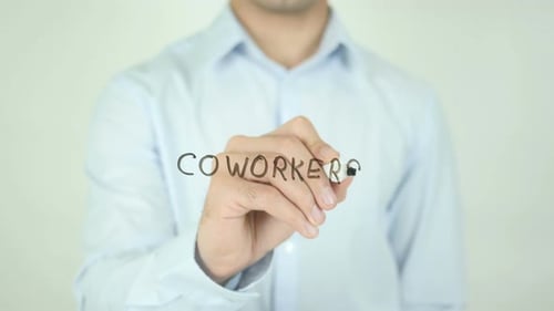 Writing Coworkers on Glass with Black Marker