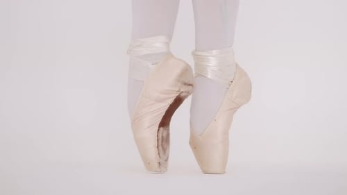 Ballet Dancer Dancing on Pointe Shoes in Studio