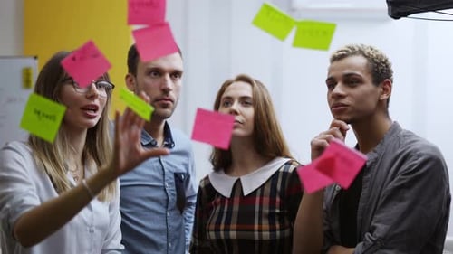 Team Brainstorming Ideas at a Workplace