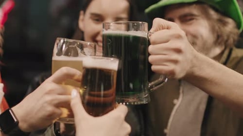 Friends Celebrating St Patricks Day Together In Pub