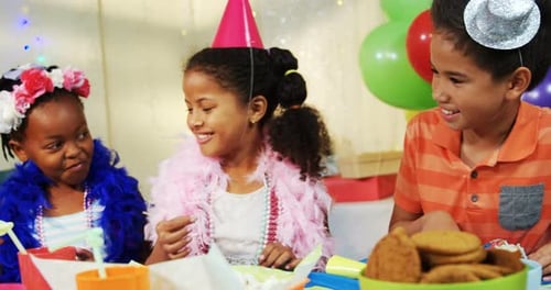 Kids having cake during birthday party 4k