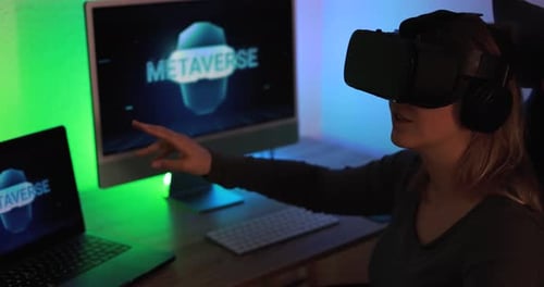 Young Adult Immersed in Metaverse With VR Headset