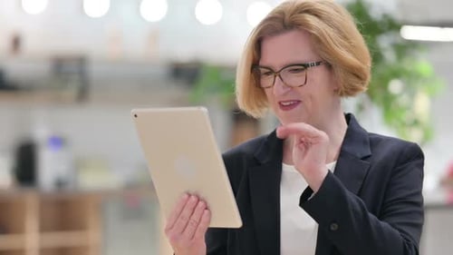 Woman Using Tablet Device for Video Call