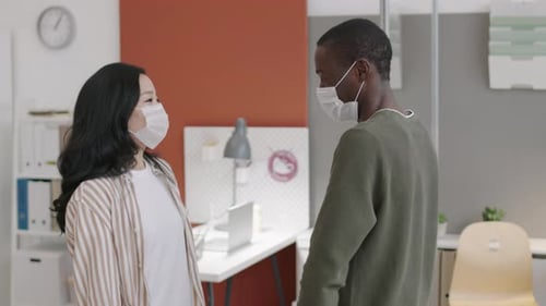 Office Workers Greeting and Chatting