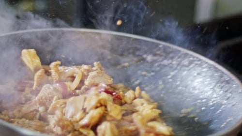 Close Up Food Cooking in a Skillet