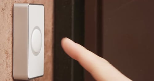 Finger Presses Doorbell Button Multiple Times