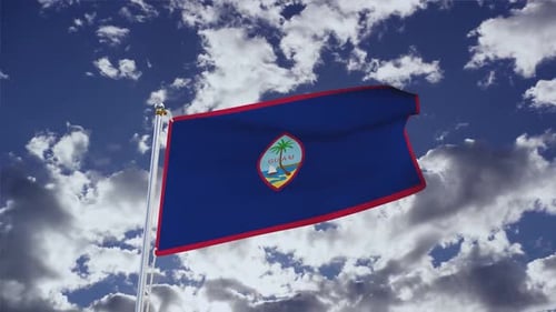 Guam National Flag Waving in Realistic Blue Sky