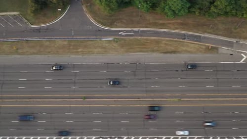 Aerial top down view of Southern State traffic as the cars go by in the day time