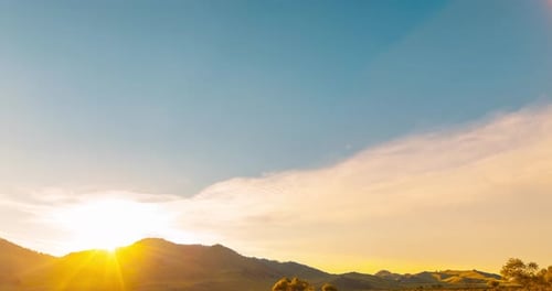 Mountain Meadow Timelapse at the Summer or Autumn Sunset Time
