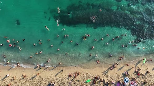 People swim in the azure sea aerial view 4 K Turkey Alanya