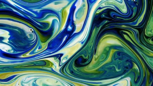 Abstract Footage of Colorful Ink Mixing Together