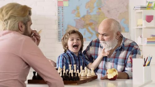 Grandfather, Grandson, and Father Play Chess