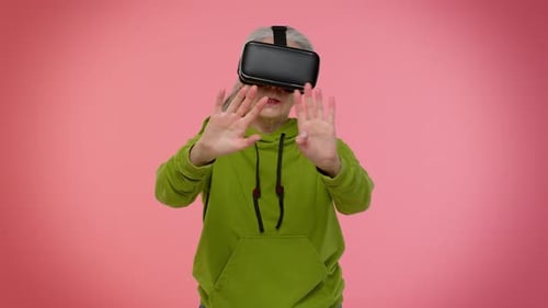 Senior Woman Using Virtual Reality Headset