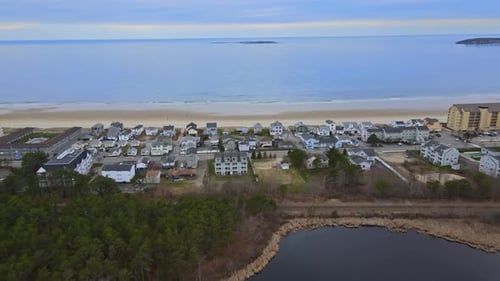 Aerial View of Beautiful Urban Landscape Small Coastal Town Ocean Landscape on Water in Summer Day