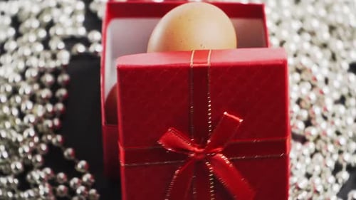 Eggs in Red Gift Box with Silver Beads