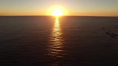 Sun Reflection on Sea Waves at Sunset