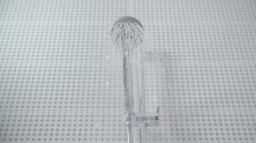 Water Flows From Silver Shower Head
