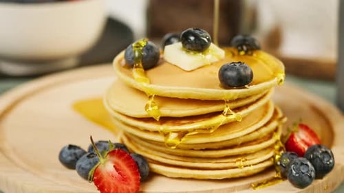 Pancakes with Blueberries and Syrup Close Up