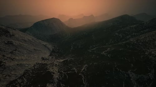 Dramatic Sky Over Rocky Mountains at Sunset