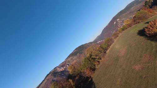 Aerial View of Autumn Waterfall Flying Over Forest in the Autumn Big Stones in the River Waterfall