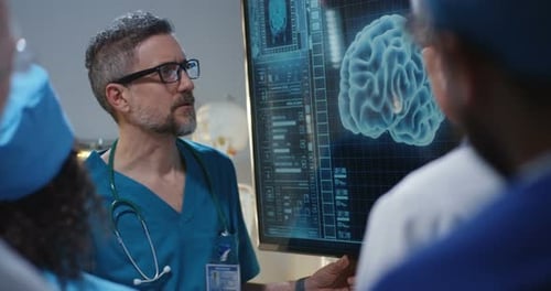 Doctors Discussing Advanced Brain Scan in Modern Hospital
