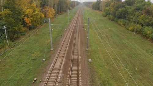 Flying Over a Yellow Road in Countryside