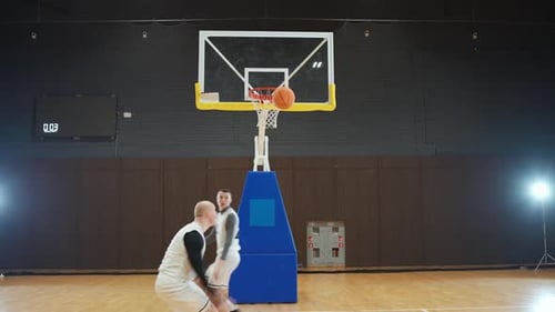Sporty Lifestyle Basketball Training Game Man Player Successfully Catches a Pass and Throws