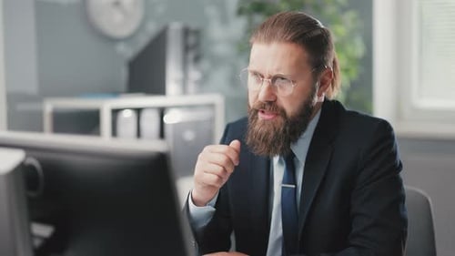 Businessman Discussing Project During Video Conference