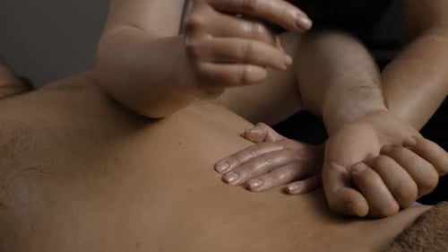 Massage Therapist Gives Back Massage in Spa