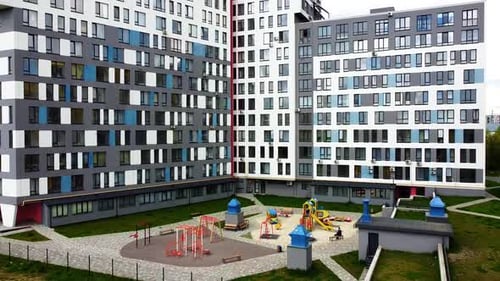 Aerial drone view of a flying over the modern residential building.