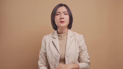 Woman Coughing Due to Illness Indoors