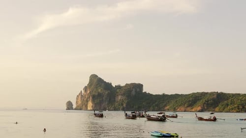 Tropical Ocean Beach Landscape with Moored Small Wooden Traditional Colorful Fishing Boats in