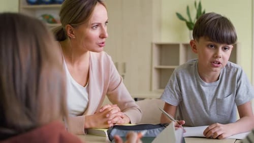 Teacher Instructing Students in Classroom Environment
