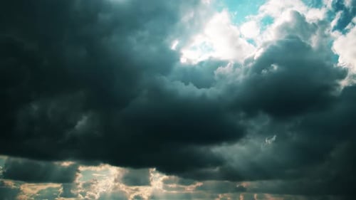 Dark Clouds and Sunbeams in the Sky