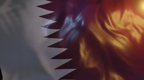 Waving Qatar Flag with Sunlight and Realistic Fabric Texture